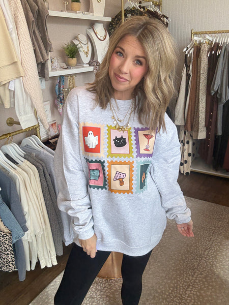 Spooky stamps sweatshirt