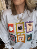 Spooky stamps sweatshirt