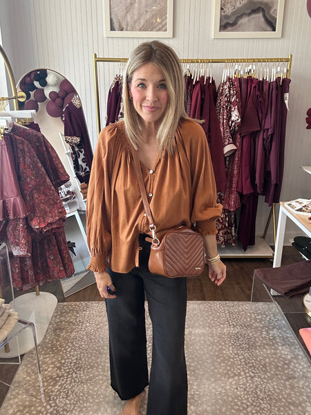 Drop shoulder blouse with smocked cuff