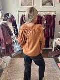 Drop shoulder blouse with smocked cuff